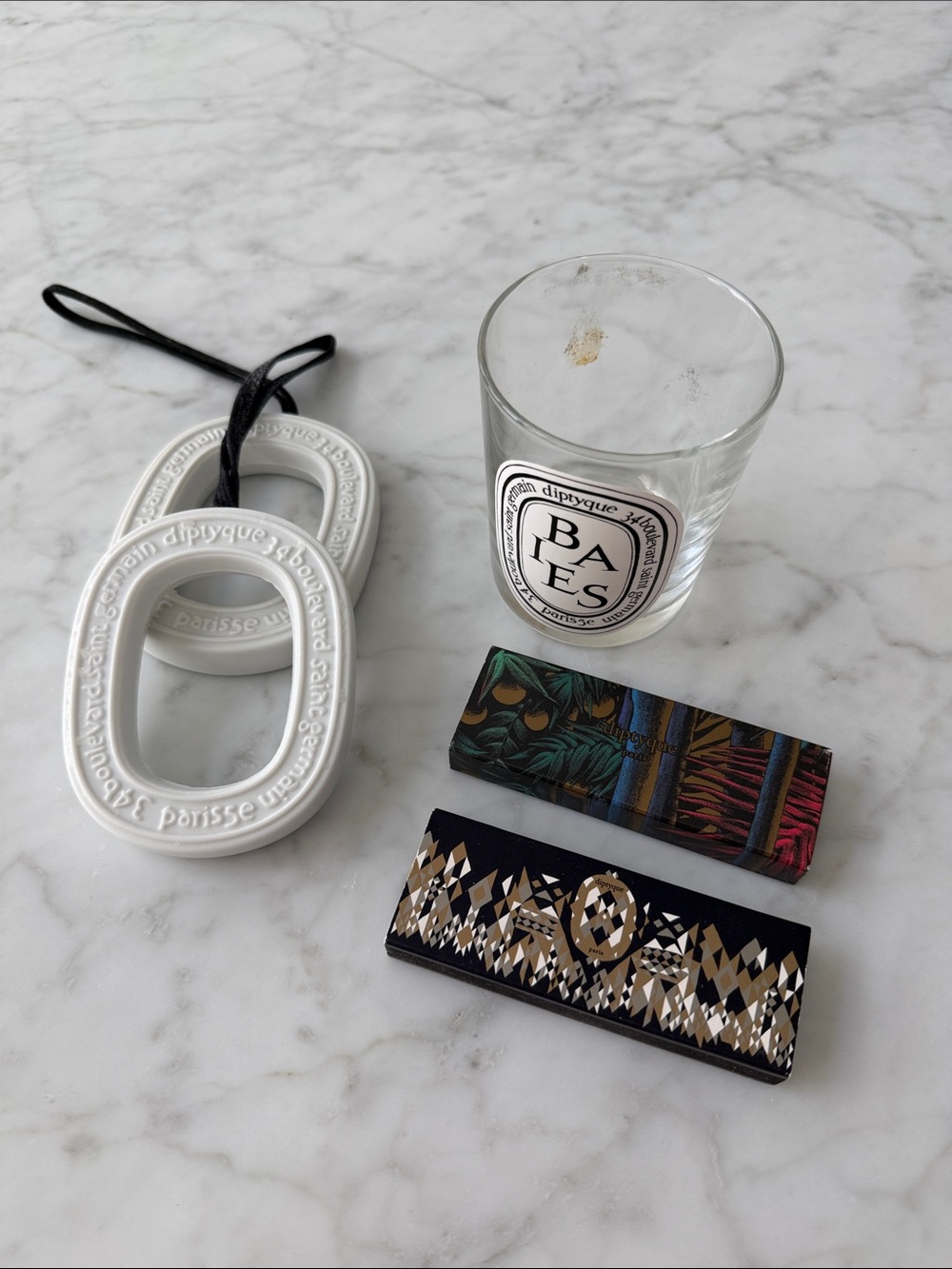 Diptque Baies Candle Jar, Scented Oval Ornaments, and new matchstick boxes